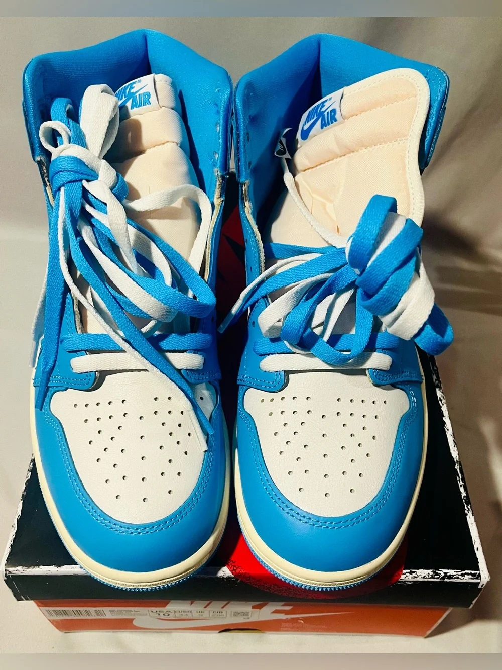 Nike Jordan Retro High-Top Sneakers in Baby Blue and White with Cream Midsole